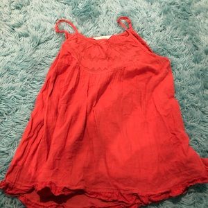 orange/red tank top